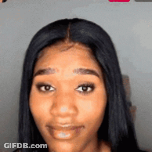 Close Up Woman With Long Black Hair Smiling GIF