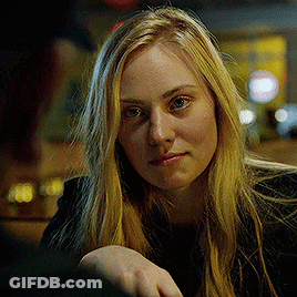 Close-Up Woman With Long Blonde Hair And Blue Eyes GIF