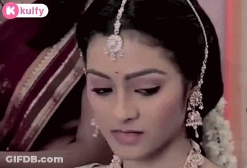Close Up Woman With Necklace And Earrings GIF