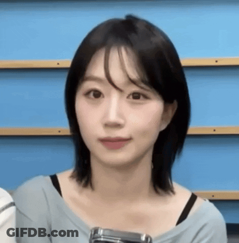 Close Up Woman With Short Hair And Bangs GIF