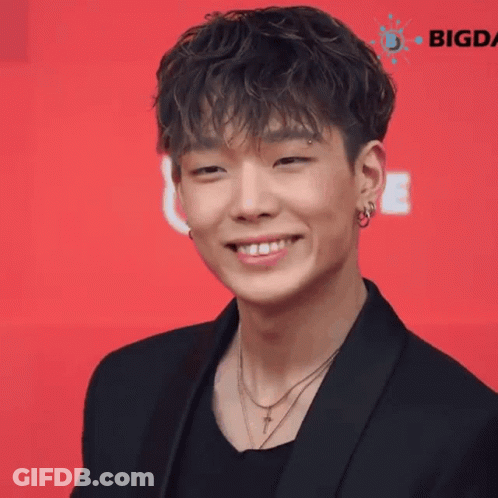Close Up Young Man Smiling In Black Jacket And Necklace GIF