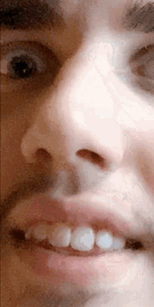 Closed Up White Guy Blinking Reaction GIF