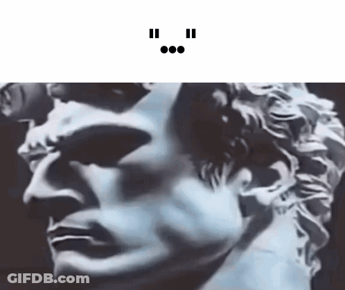 Closeup Man Statue Face On Black GIF