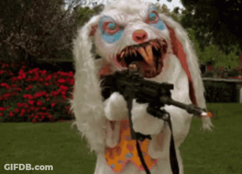 Clown Bunny Holding Gun In Mouth GIF