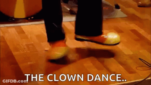 Clown Dancing On Wooden Floor GIF