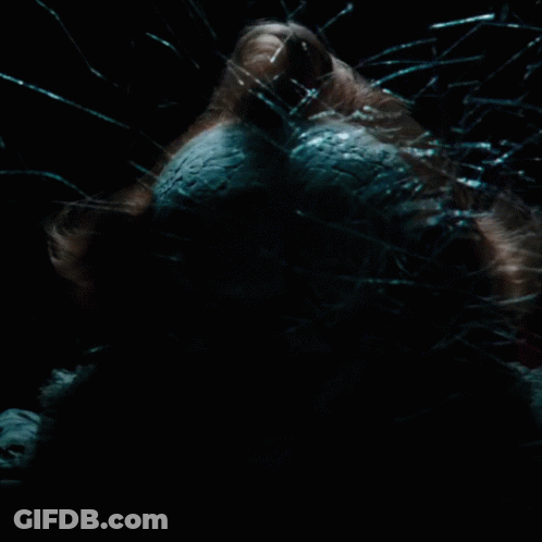 Clown Face Close Up Broken Glass Background GIF
