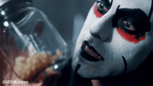 Clown Face Close Up With Glass GIF