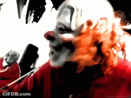 Clown Face Close Up With Red Hair GIF