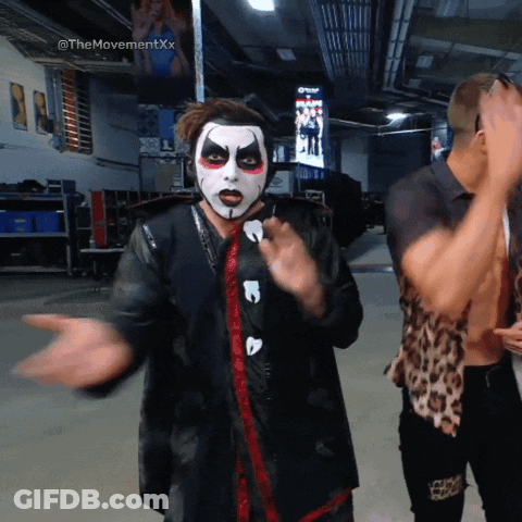 Clown Face Man Standing Next To Another GIF