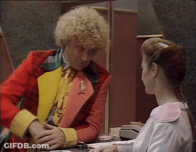 Clown Giving Flowers To Woman GIF