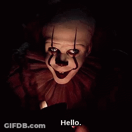 Clown Holding Cell Phone Saying Hello GIF