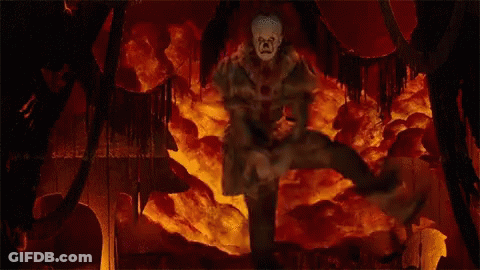 Clown In Cave With Fire GIF