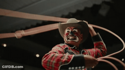 Clown In Cowboy Hat Holding Rope GIF