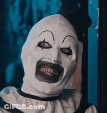 Clown In White Mask With Huge Smile GIF