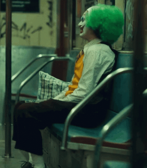 Clown Joker Laughing Alone At The Subway GIF