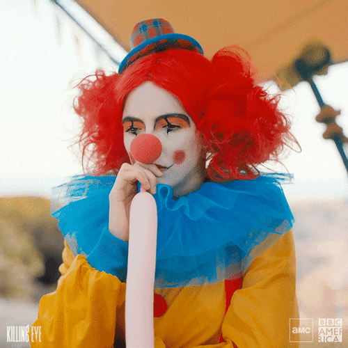 Clown Long Pink Balloon Deflating GIF