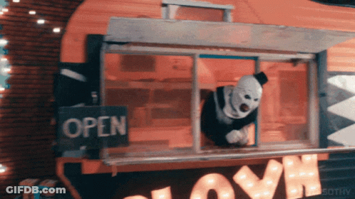 Clown Looking Out Window With Open Sign GIF