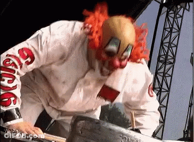 Clown Playing Keyboard On Stage GIF