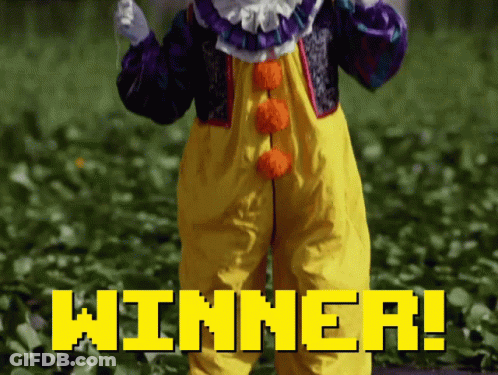 Clown Standing In Field With Winner GIF