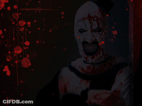Clown With Blood On Face And Black Top Hat GIF