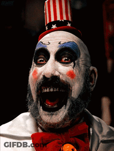Clown With Red White Blue Top Hat And Bow Tie GIF