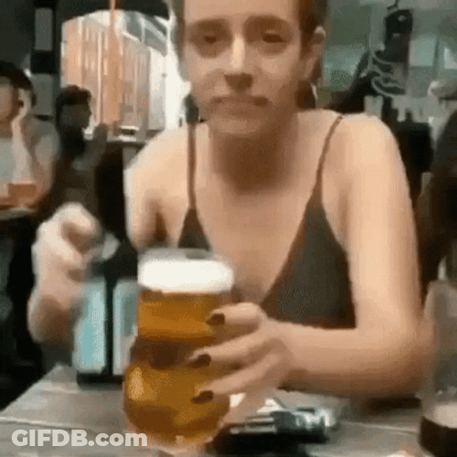 Clumsy Woman Chugging Beer GIF