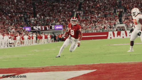 Coach Talking To Football Players In Locker Room GIF