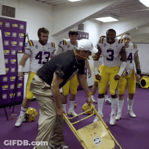 Coaching Staff Of Ed Orgeron Smashing Steel Chair GIF