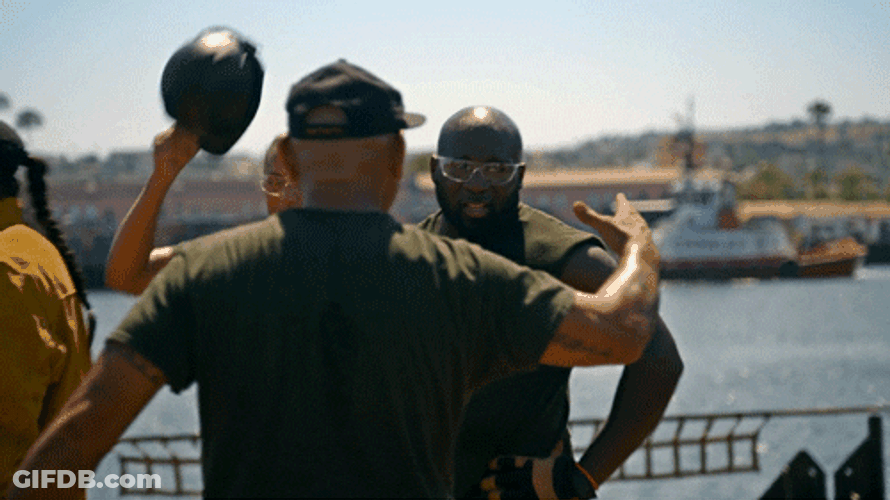Coast Guard Men Hugging GIF