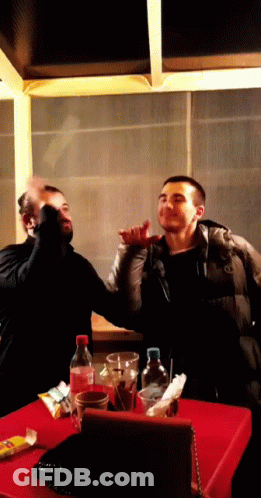 Coca Cola Bottle With Two Men GIF