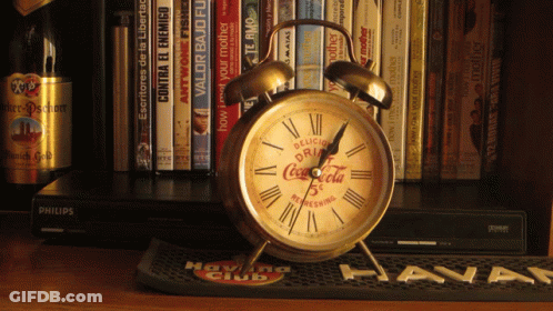 Coca Cola Clock On Havana Club Mat GIF