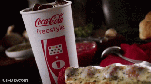 Coca Cola Freestyle Cup Beside Pizza GIF