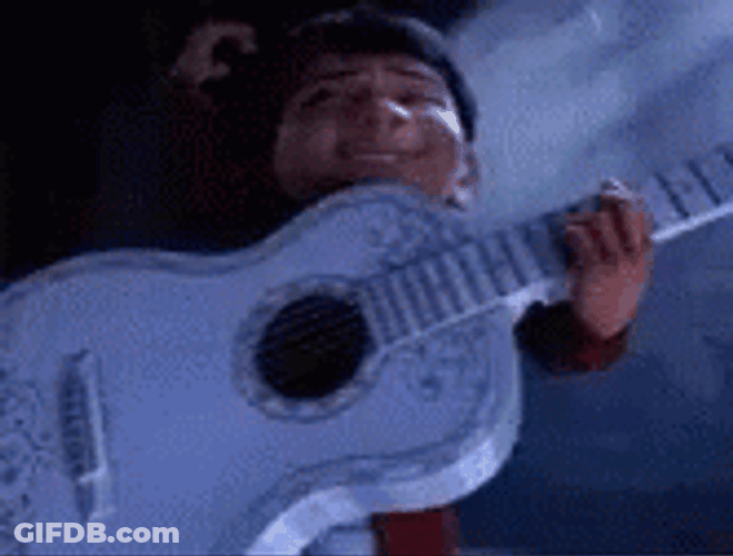 Coco Miguel Playing Guitar Inside Fire GIF