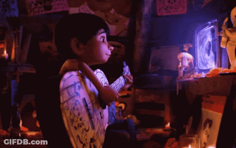 Coco Miguel Playing Guitar While Watching Tv GIF