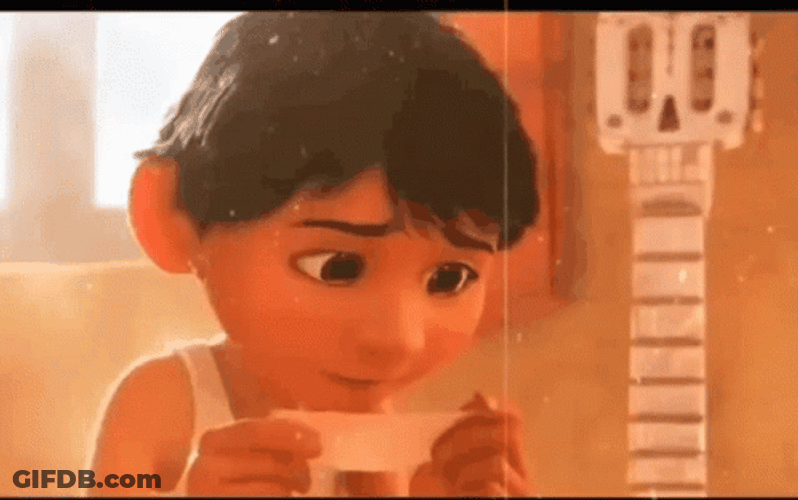 Coco Miguel Reading Something GIF