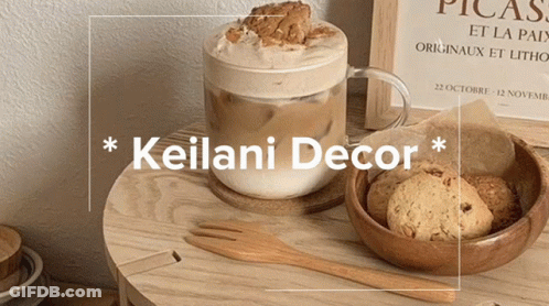 Coffee And Cookies On Wooden Table With Keilani Decor GIF
