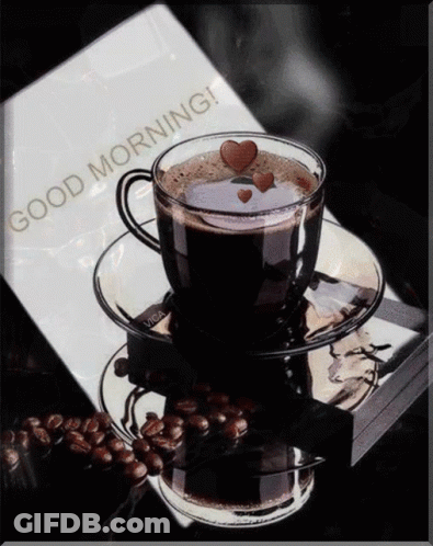 Coffee Cup On Saucer Next To Good Morning Book GIF