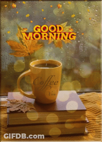 Coffee Cup On Table By Rainy Window GIF
