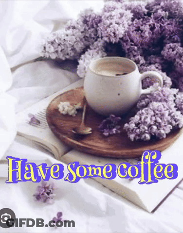 Coffee Cup On Wooden Tray With Purple Flowers Saying Have Some Coffee GIF
