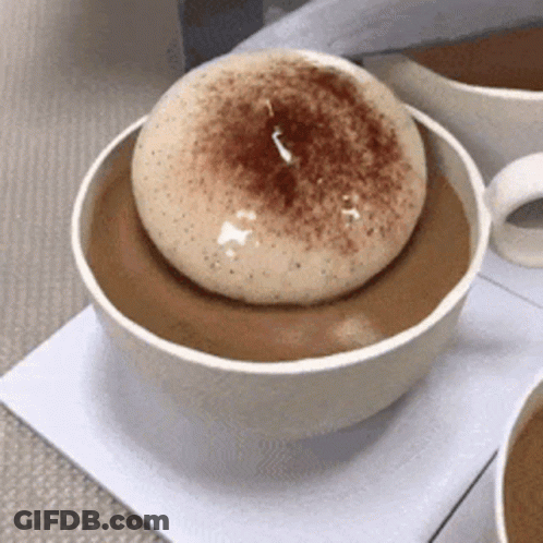 Coffee Cup With Donut Inside GIF