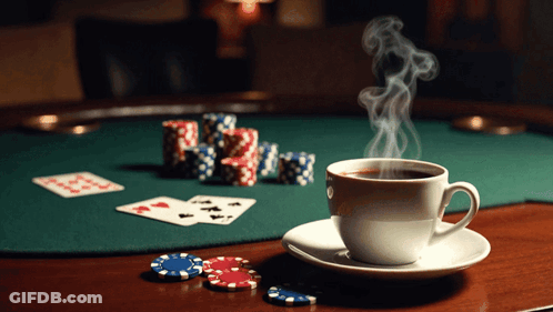 Coffee Cup With Poker Chips And Cards GIF