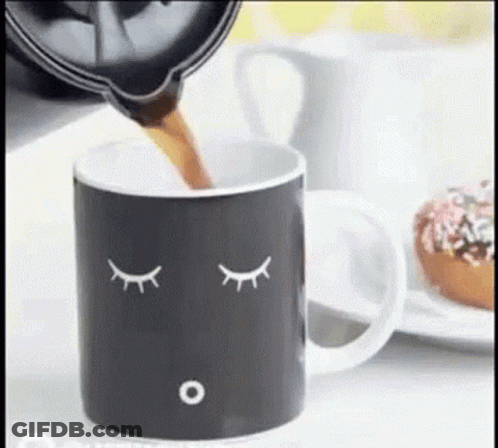 Coffee Pouring Into Sleeping Face Mug GIF