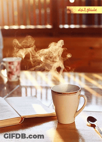 Coffee With Steam Next To Open Book GIF