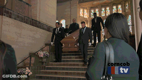 Coffin Carried Up Stairs In Church With Corncob TV GIF
