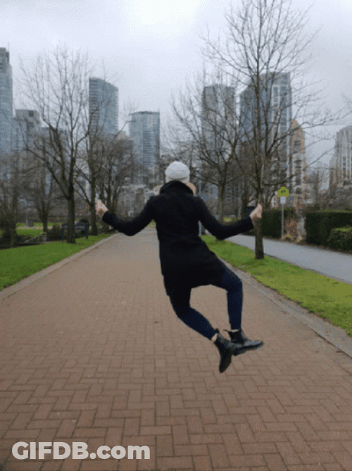 Cold Woman Jumping For Joy GIF