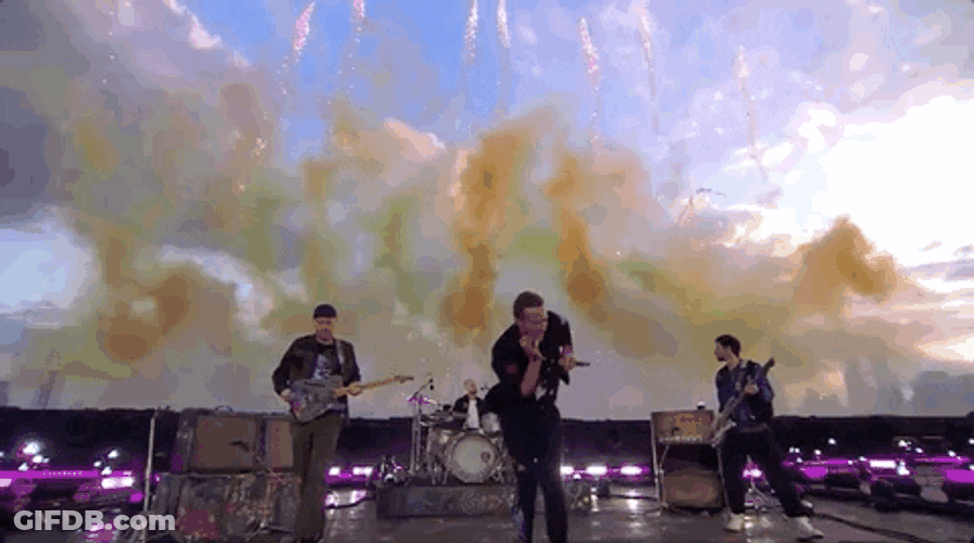 Coldplay At Brit Awards With Smoke Above Them GIF