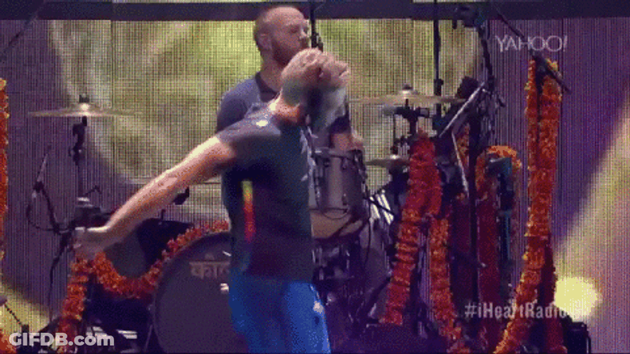 Coldplay Chris Martin Spinning On Stage GIF