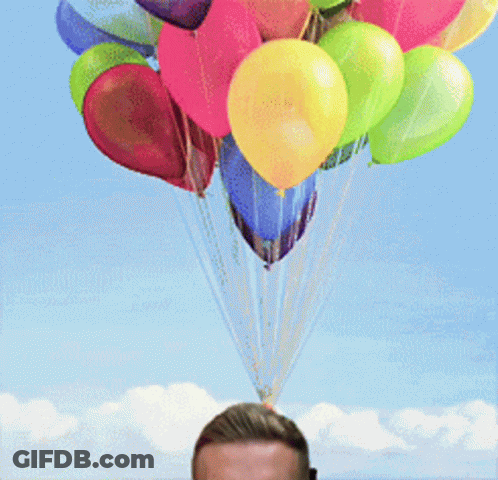 Colorful Balloons Hanging Over Man's Head GIF