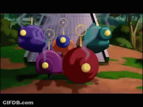 Colorful Balls In Front Of Pyramid GIF