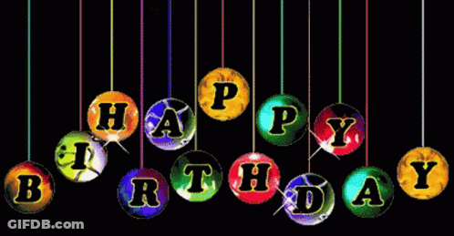 Colorful Balls With The Words Happy Birthday Hanging From Strings On A Black Background GIF